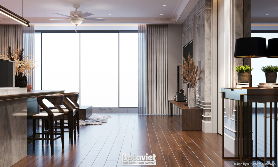 Phòng bếp nhìn từ góc đối diện, với đảo bếp lớn và hệ tủ bếp gỗ tối màu. Tường ốp đá marble vân mây sang trọng. Không gian…