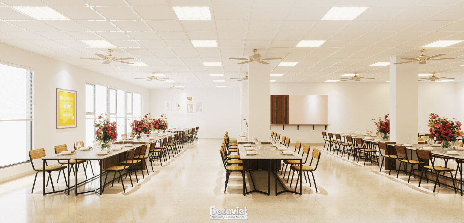 Khu ăn tập thể, view dọc theo chiều sâu phòng với nhiều dãy bàn ghế gỗ nối tiếp, cột nhà ốp gỗ điểm xuyết. Quạt trần đều t…