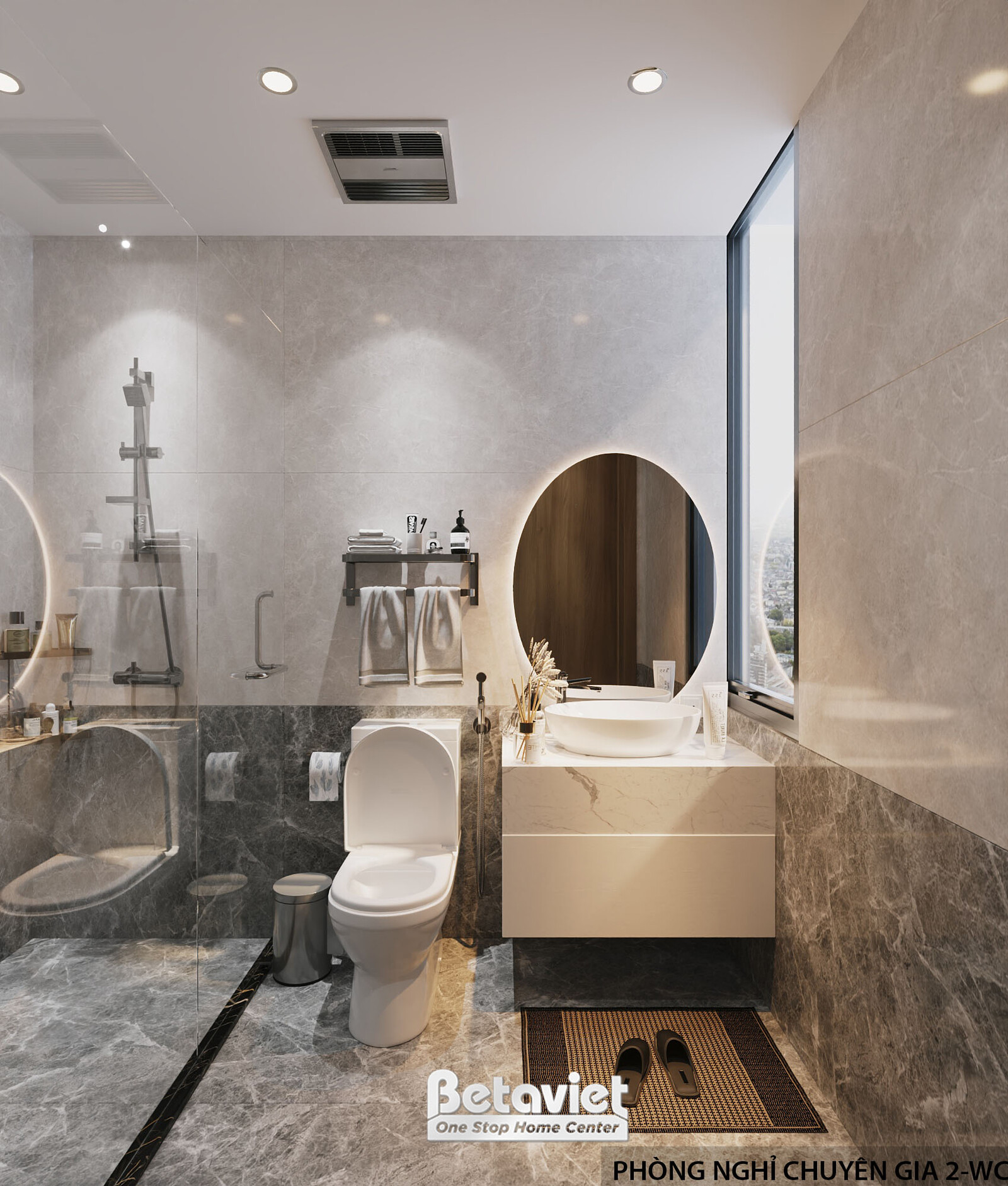 Phòng vệ sinh khu nghỉ chuyên gia với vách đá marble nâu-xám sang trọng, bồn rửa hình oval mặt đá be, gương tròn viền gỗ…