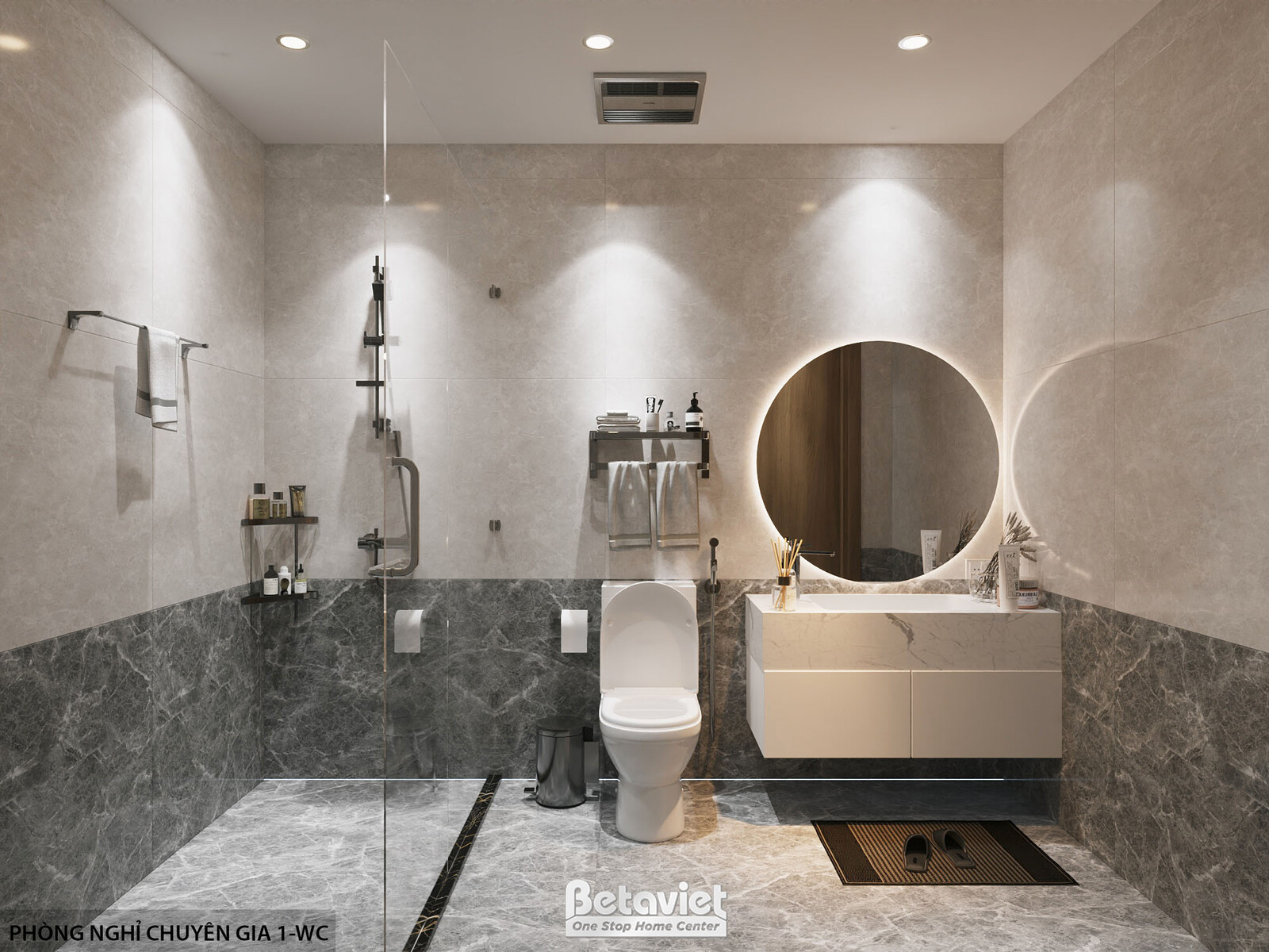 Phòng vệ sinh 1-WC nhìn diện chính đối xứng, vách kính khu tắm đứng bên trái ốp đá xám đậm, bồn cầu ở giữa, tủ lavabo mặt…