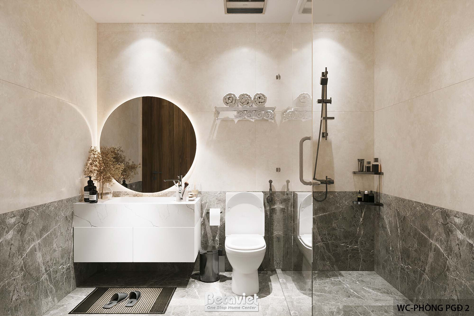 Phòng vệ sinh phó giám đốc với gương tròn viền đèn LED làm điểm nhấn, vách ốp đá marble xám đậm, bồn rửa mặt đá trắng, khu…
