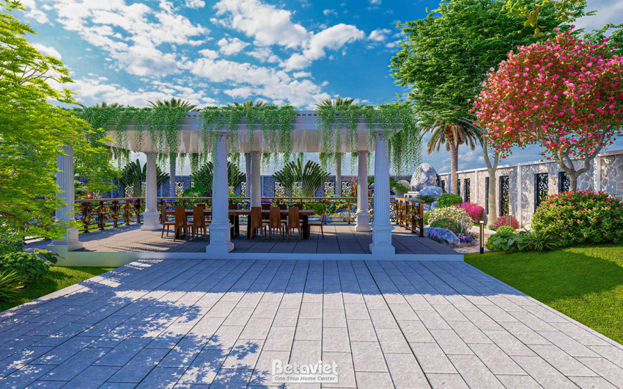 Pergola cột đá trắng phong cách cổ điển kết hợp giàn dây leo xanh mát, khu vực bàn ghế ăn ngoài trời lát đá, cây cọ và hoa…
