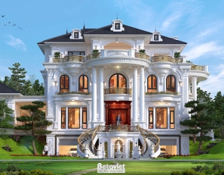 Phối cảnh mặt tiền chính diện cận hơn, cầu thang cong đôi dẫn lên sảnh cửa gỗ nâu trầm, hàng cột tròn to bản chạy dọc thân…