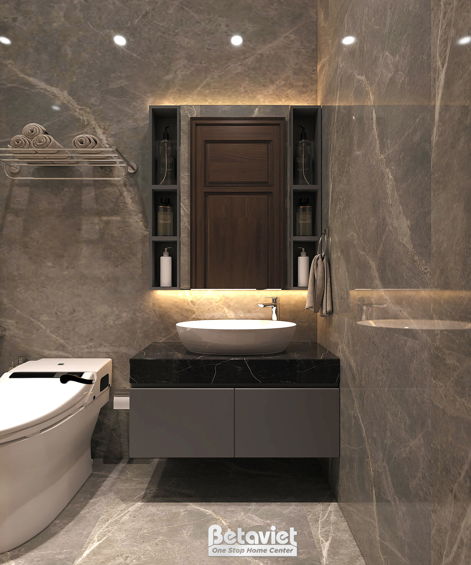 Khu lavabo phòng tắm với gương tủ gỗ nâu có đèn hắt dưới, mặt bàn đá đen đặt chậu rửa tròn nổi. Bồn cầu thông minh liền kề…