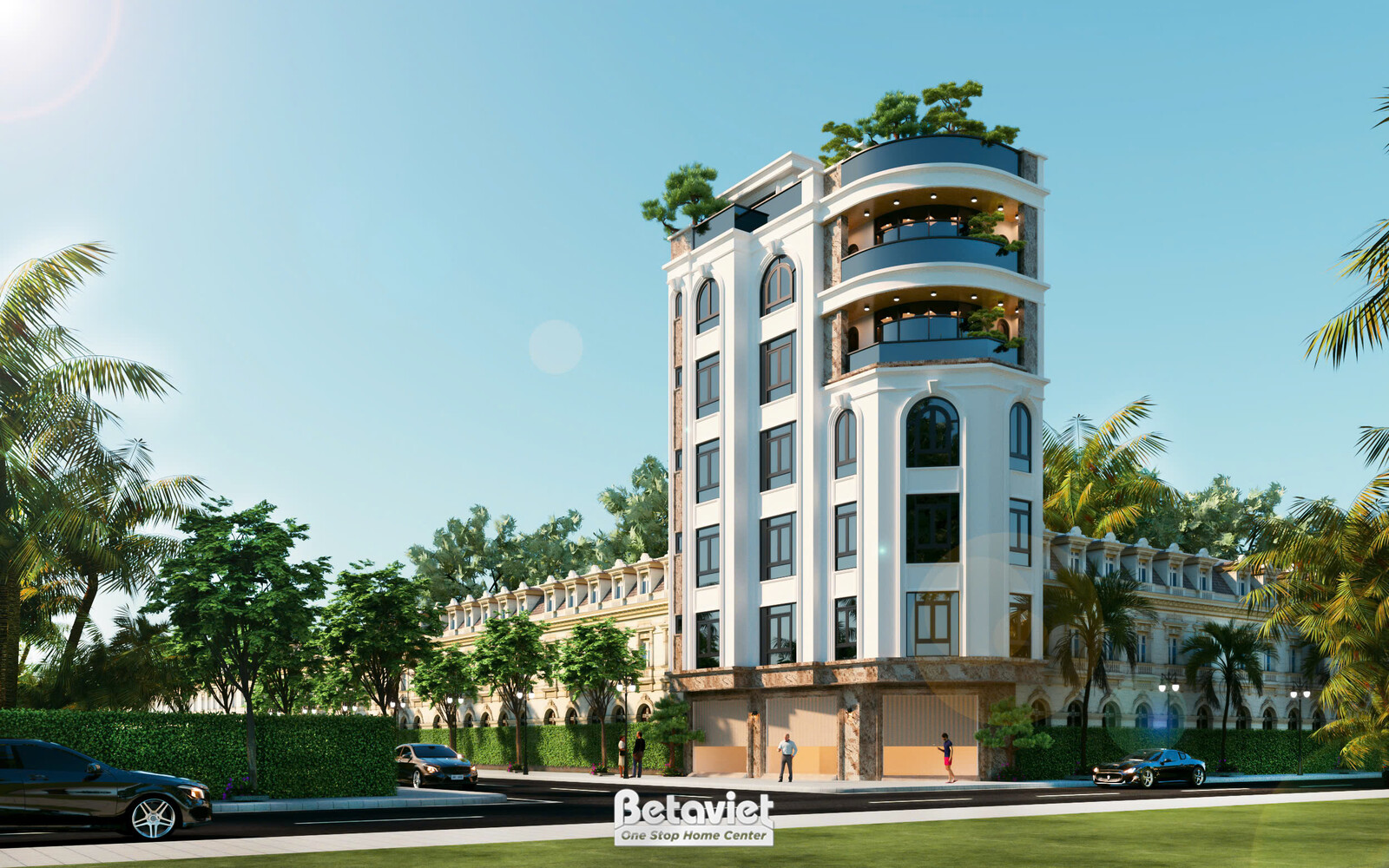 Cận cảnh khối tháp góc, lấy nét vào hệ cửa sổ vòm cổ điển và ban công tròn phủ dây leo xanh mướt; hàng rào cây xén thấp ph…