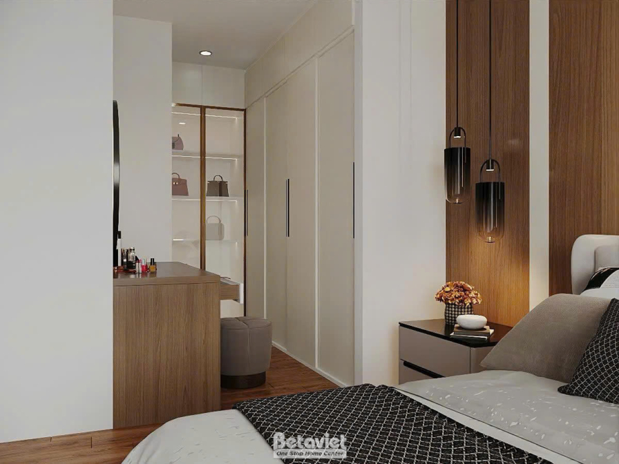 Góc thay đồ liền phòng ngủ với tủ kính trưng bày túi xách, bàn trang điểm gỗ nâu, đèn thả pha lê nhỏ hai bên, cạnh giường…