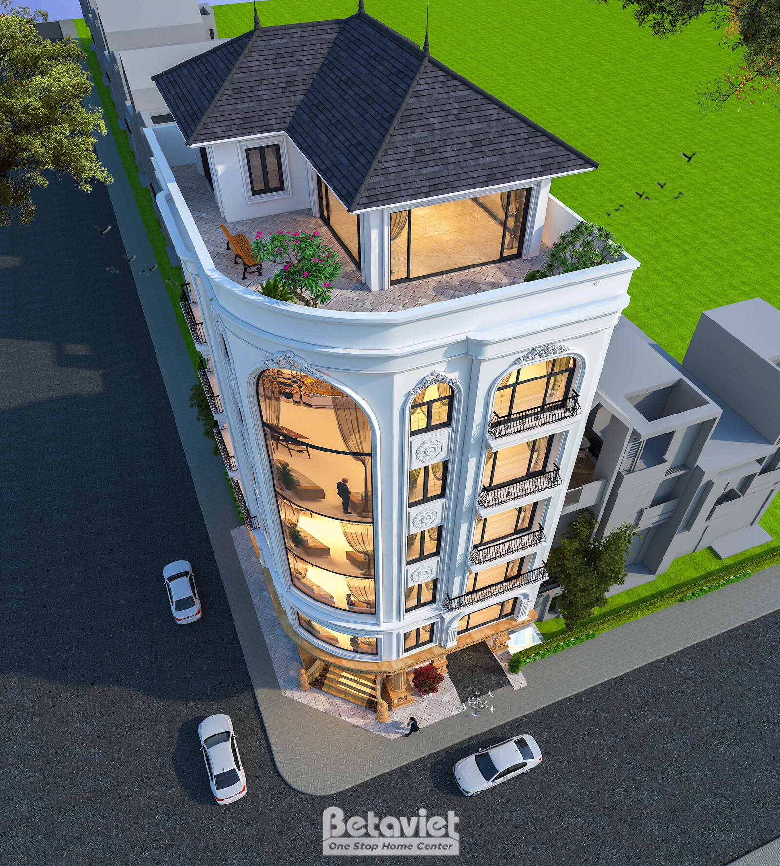 Góc nhìn từ trên cao chếch dọc theo con đường, thấy rõ phần mái tum dạng chóp nhỏ và sân thượng trồng cây xanh trên nóc tò…