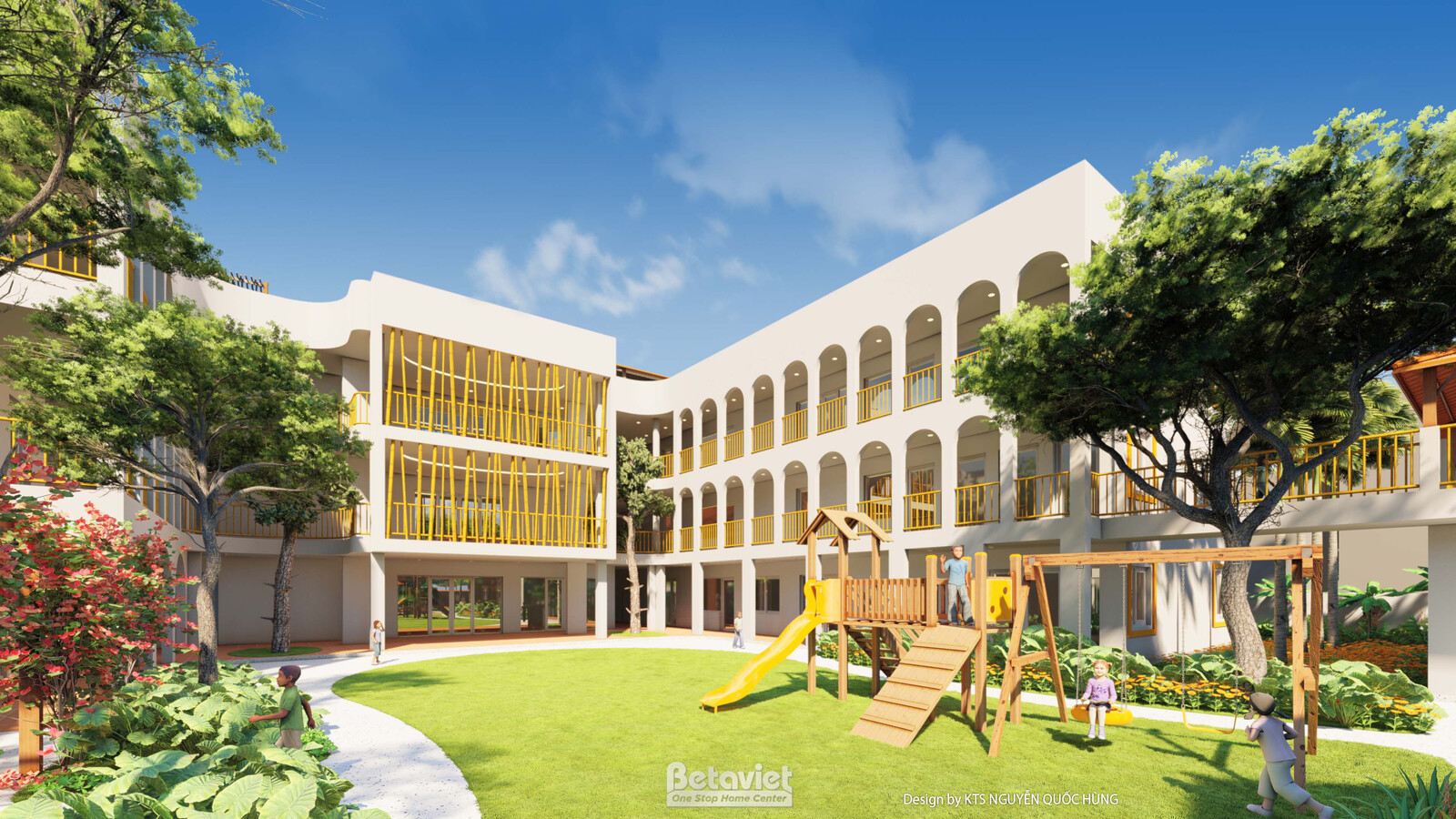 Khối nhà học với hành lang vòm cuốn liên tiếp chạy dọc tầng trên, tường sơn trắng kem điểm viền vàng, phía trước sân cỏ rộ…