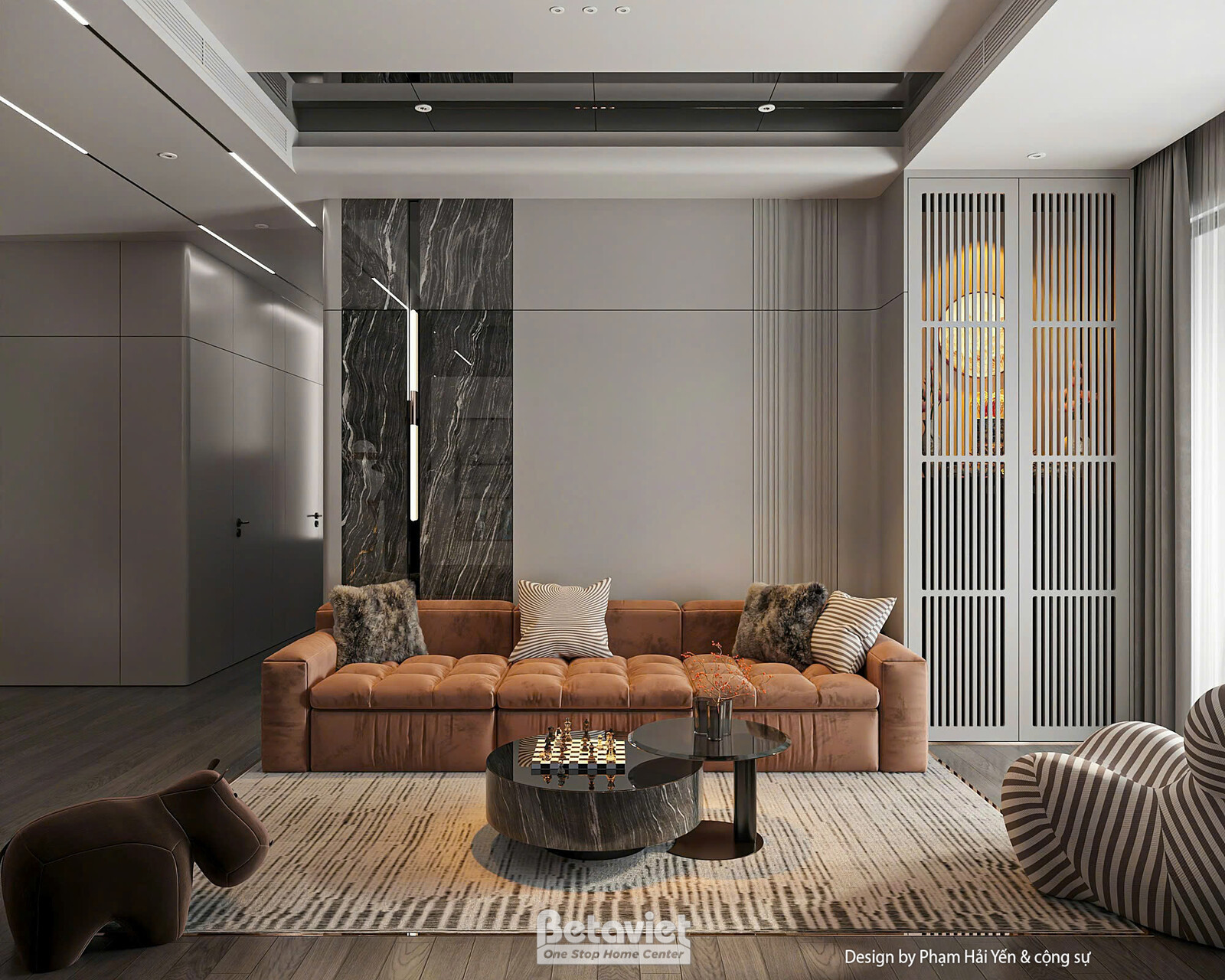 Phòng khách nhìn từ hướng cửa vào, sofa nhung nâu cam kê song song ghế bành sọc kem, phía sau là hệ tủ lưới trang trí màu…