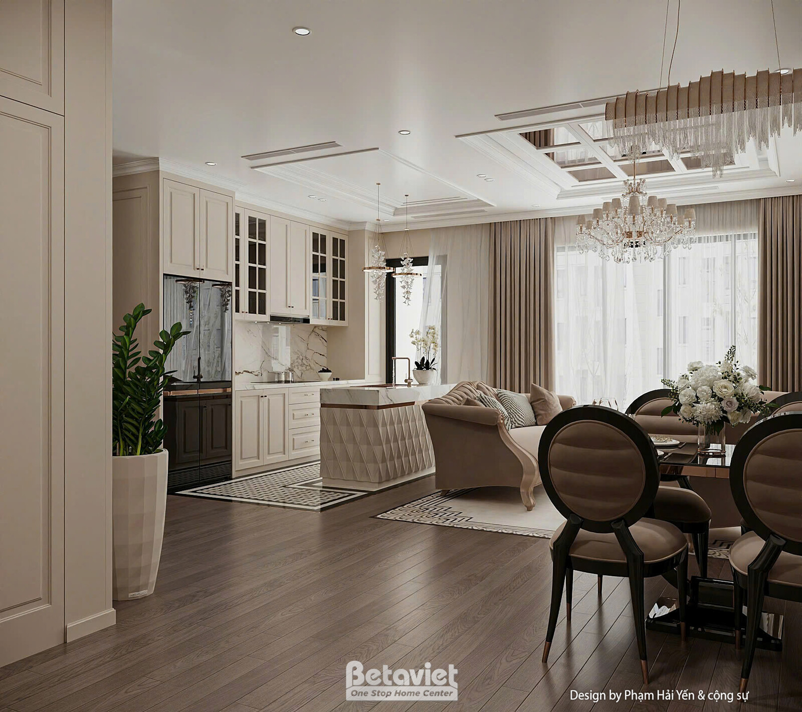 Toàn cảnh khu bếp - khách - ăn liên thông, tủ bếp màu tối góc trái, sofa be, bàn ăn ghế bọc hoa văn, cây xanh trang trí, c…
