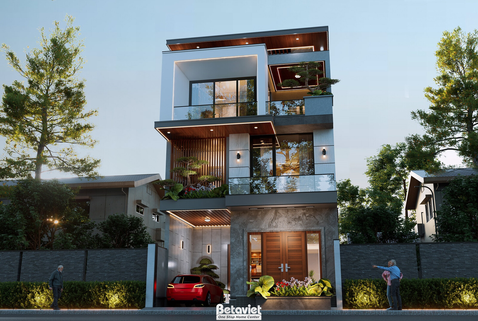 Cận cảnh lối vào buổi tối với xe màu đỏ đậu trước cửa gỗ tự nhiên, chậu cây và bụi cây thấp viền lối đi, tường ốp đá xám…
