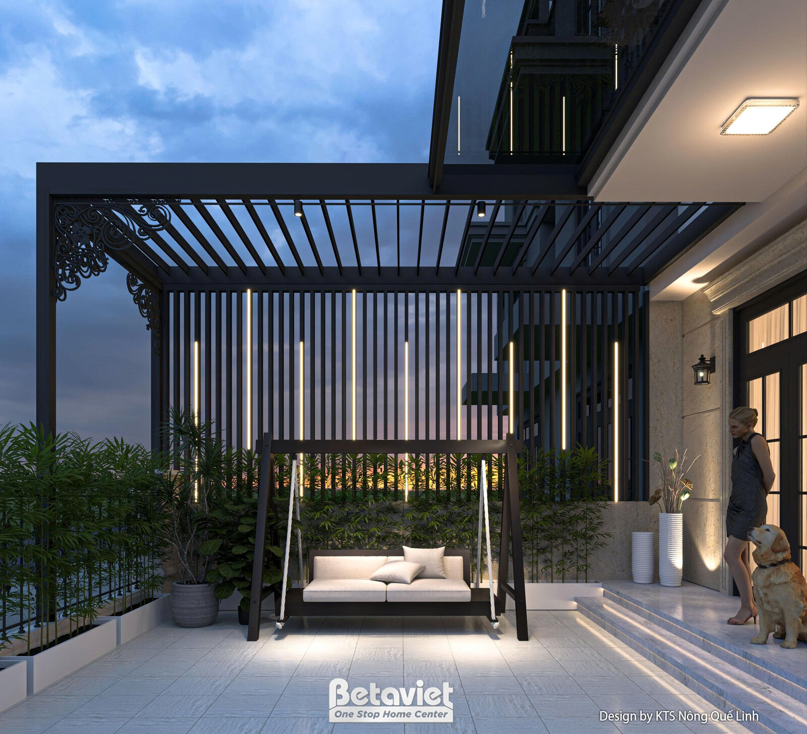 Sân trong buổi tối dưới hệ lam thép đen, xích đu khung chữ A đệm kem đặt giữa cây xanh và vách lam che nắng. Ánh đèn vàng…
