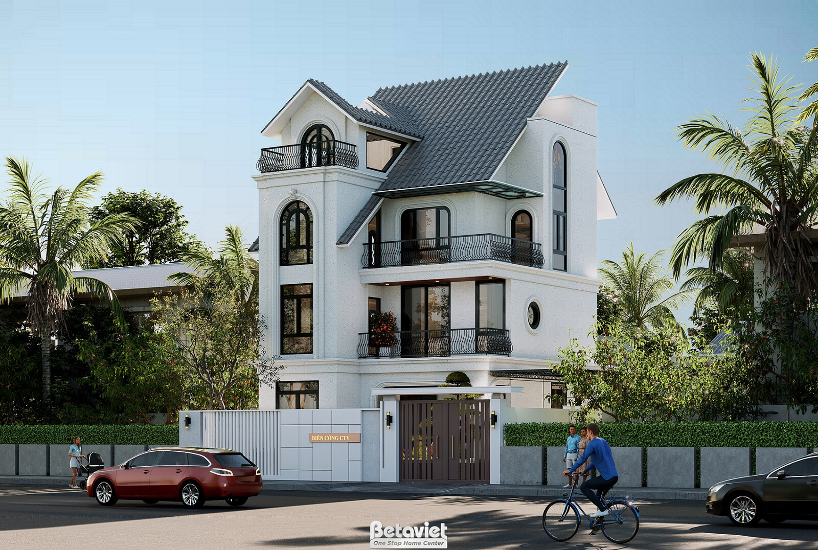 Góc chéo từ ngã ba đường bao quát mặt tiền và mặt bên công trình, tháp cửa sổ vòm và ô cửa tròn nổi bật, mái Mansard ngói…